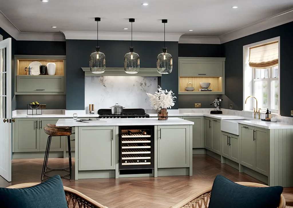 Chillingham kitchen in sage green with an island and wine cooler, fitted room view