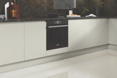 Lucente handleless kitchen in Matt Light Grey, fitted room view